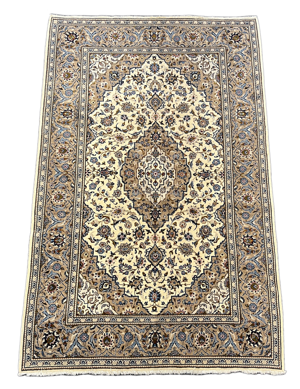 A Kashan ivory ground carpet